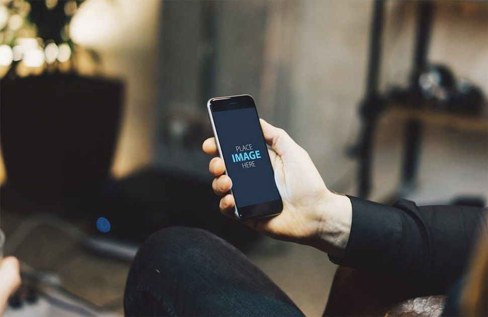 man-looking-at-iphone-mockup